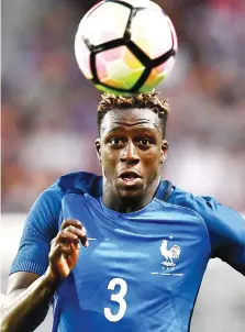  ?? — AFP photo ?? This file photo taken on June 02, 2017 shows France’s defender Benjamin Mendy eyeing the ball during the friendly football match France versus Paraguay on June 2, 2017 at the Roazhon Park stadium in Rennes.