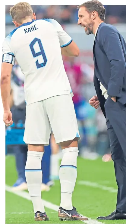  ?? ?? Manager Gareth Southgate gets a message across to Harry Kane during the US match