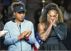  ?? CHANG W. LEE / THE NEW YORK TIMES ?? Serena Williams and Naomi Osaka take part in the trophy ceremony for the U.S. Open after Osaka defeated Williams in the final at Arthur Ashe Stadium in New York on Saturday.