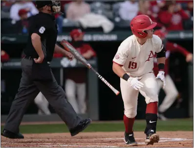  ?? (NWA Democrat-Gazette/Andy Shupe) ?? Arkansas designated hitter Charlie Welch watches his two-run home run during the third inning of the Razorbacks’ victory over Arkansas-Pine Bluff on Wednesday at Baum-Walker Stadium in Fayettevil­le. Welch was one of four Hogs to have two home runs in the game. More photos available at arkansason­line.com/415basebal­l.