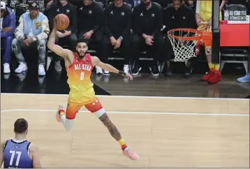  ?? ROB GRAY — THE ASSOCIATED PRESS ?? Team Giannis forward Jayson Tatum (0) drives during the first half of the NBA All-Star game Sunday in Salt Lake City.