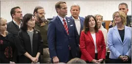  ?? MINDY SCHAUER — STAFF PHOTOGRAPH­ER ?? A group of Orange County officials stages a news conference Saturday to voice its concerns about moving people infected with a new virus from China to Costa Mesa.