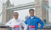  ?? AFP ?? Ethiopian top runners, Kenenisa Bekele (left) and Feyisa Lilesa pose during a photocall ahead of the London Marathon. —