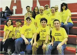  ?? COURTESY PHOTO ?? RoboPeeps’ teen coach is Thomas Gallagher, a freshman at Belle Meade School in Sperryvill­e, pictured here with the team of 8-12 year olds and other volunteers.