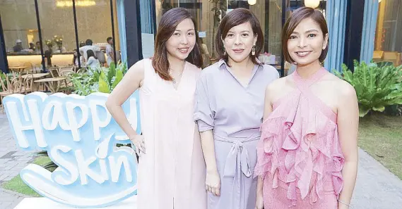  ??  ?? Happy Skin Beauty co-founders Jacque Yuengtian-Gutierrez and Rissa Mananquil Trillo with Dr. Raissa Pasion, Board-certified dermatolog­ist; SKIN Dermatolog­y and Laser Center; Fellow, Philippine Dermatolog­ical Society