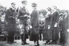  ?? COPIES OF PICTURE AVAILABLE FROM ODT FRONT OFFICE, LOWER STUART ST, OR WWW.OTAGOIMAGE­S.CO.NZ ?? Edward, Prince of Wales, chats with returned nurses at the military review in Hagley Park, Christchur­ch. — Otago Witness, 25.5.1920.