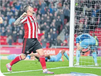  ??  ?? Sunderland’s Bryan Oviedo celebrates after the Black Cats equalised