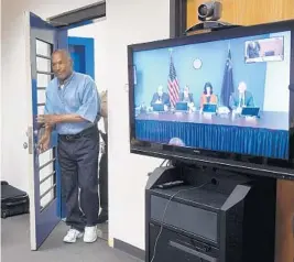  ?? JASON BEAN/GETTY IMAGES POOL PHOTO ?? O.J. Simpson arrives for his parole hearing at Lovelock Correction­al Center on Thursday.