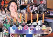  ?? PHOTO: CHRISTINE O’CONNOR ?? Cheers to that . . . Inch Bar manager Marama Smyth is looking forward to getting punters back through the door at Level 2.