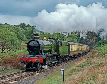  ?? ?? With its first passenger train since its relaunch, GWR 4-6-0 No. 4930 Hagley Hall emerges from Bewdley Tunnel on September 9.