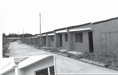  ?? ALDO NELBERT BANAYNAL ?? At least 100 families get their new houses in Balai Bantayan, a housing project of the National Housing Authority located in Barangay Kabac, Bantayan town.