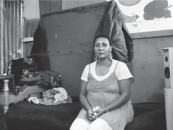  ?? Picture: David Goldblatt ?? A MOTHER’S NIGHTMARE Ellen Pakkies sits on the same bed in her Lavender Hill home where she strangled her son Abie to death in 2007. She says the crime was ‘sad, but also not sad’, and gave her a sense of peace.