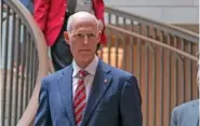  ?? AP PHOTO/J. SCOTT APPLEWHITE ?? Sen. Rick Scott, R-Fla., heads to a classified briefing on China Wednesday at the Capitol in Washington.