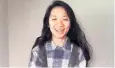  ??  ?? Cool girl in school: Chloé Zhao picked up her best director award in a plaid shirt