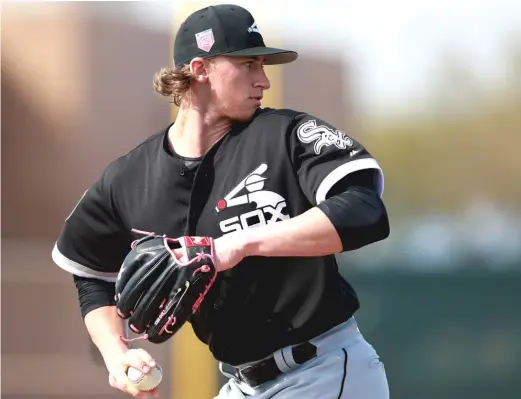  ?? AP PHOTOS ?? Sox prospects Michael Kopech ( above) and Eloy Jimenez ( left) are doing some good things in the minors, but they still have work to do before coming to Chicago.