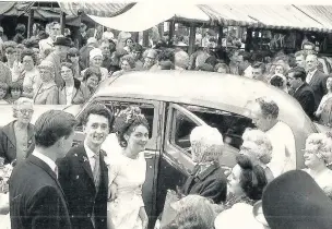  ??  ?? ●●Mavis and John Mudge leaving the church after their wedding in 1964 Picture by John Smart