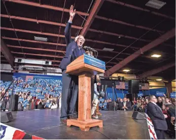  ?? GLENN RUSSELL, THE BURLINGTON FREE PRESS ?? Sen. Bernie Sanders evoked cheers with a familiar refrain in Essex Junction, Vt., on Tuesday: “This is not just about electing a president. It’s about making a political revolution!”