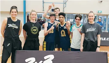  ??  ?? Winners of the 3x3 Hustle from Frankston, Vincent Davies, Jack Franulovic, Alex Nanette, and Harry Gledhill are flanked by Melbourne Boomers Penina Davidson, Rachel Brewster and Tess Magden.