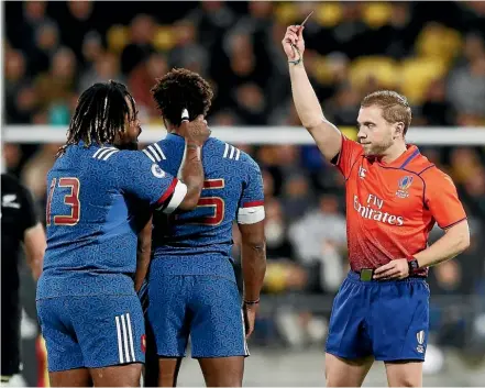  ?? GETTY IMAGES ?? Referee Angus Gardner shows France fullback Benjamin Fall a red card after his mid-air collision with Beauden Barrett led to the All Black first five-eighth failing a head injury assessment.