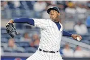  ??  ?? Yankees pitcher Aroldis Chapman delivers a pitch during the ninth inning of a game against the Boston Red Sox on July 17 in New York. The Yankees won 3-1.
Aroldis Chapman