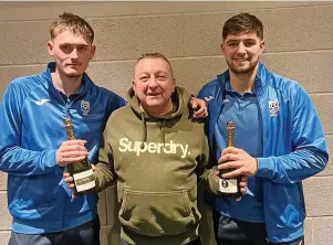  ?? Picture: Hallen AFC ?? Hallen’s Cory Thomas-Barker, left, and Elliot Gardner receive joint man-of-the-match awards from matchday sponsor Declan Harrington