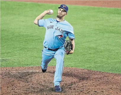  ?? BRYAN M. BENNETT GETTY IMAGES FILE PHOTO ?? A.J. Cole of the Toronto Blue Jays pitches in Buffalo in August. “If (the Jays) play in Toronto, there are more advertisin­g revenues … if there are audiences, then that’s a huge potential for additional revenues,” said Tony Staffieri, chief financial officer of Rogers.