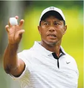  ?? ERIC GAY AP ?? Tiger Woods, at practice Tuesday, knows walking the course will be his most difficult task at the PGA.