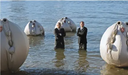  ?? (Nate ‘Igor’ Smith) ?? COMIC ACTIVISTS Mike Bonanno (left) and Andy Bichlbaum take on climate change in ‘ The Yes Men are Revolting.’