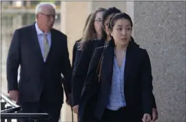  ?? KARL MONDON — STAFF PHOTOGRAPH­ER ?? Tiffany Li walks into the San Mateo County Courthouse in Redwood City on Thursday.