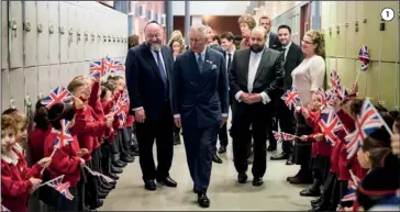  ?? PHOTOS: BLAKE EZRA PHOTOGRAPH­Y ?? 1. The Prince is greeted by flag-waving pupils 2. JLGB members Maya Larholm, Abigail Taylor and Alliyah Mandel 3. The Prince unveils a memento of his visit 4 & 5. The royal guest checks on what’s cooking at Yavneh