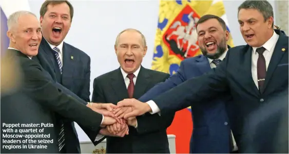  ?? ?? Puppet master: Putin with a quartet of Moscow-appointed leaders of the seized regions in Ukraine