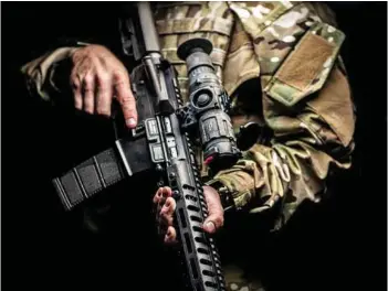  ?? PHOTOGRAPH: Trijicon ?? US Army soldiers use durable and versatile Trijicon optics on their weapons