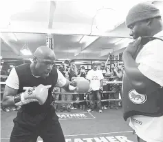  ??  ?? Floyd Mayweather Jr. works out at the Mayweather Boxing Club in Las Vegas, Nevada in this April 17, 2013 file picture. — AFP photo