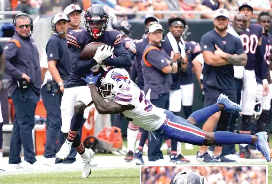  ?? DAVID BANKS/AP ?? Rodney Adams catches a pass from Andy Dalton, eludes Siran Neal and scores a 73-yard touchdown in the second quarter Saturday. After reaching the end zone, he celebrates by rocking the football like a baby. His wife gave birth to a girl Friday.