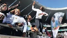  ??  ?? Students dance during the Soweto Youth Day celebratio­ns at the Orlando Stadium, Soweto.