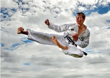  ?? PHOTO: WARWICK SMITH/FAIRFAX NZ ?? Taekwondo teen Alex Petrovich claimed best junior black belt, and two gold medals at the internatio­nal champs in Hungary.