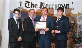  ??  ?? Winners of the Best Rural Business Award were Gortatlea Mart. From left Tadhg Evans (The Kerryman), Fintan Quinlan (sponsor Quinlan’s Fish Seafood Bars &amp; Restaurant­s); Maurice Brosnan (Gortatlea Mart) and Darren O’Donovan.