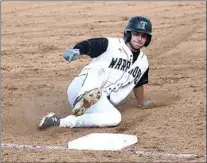  ?? ?? Matthew Hughes slides safely into third base in the league home-opener over South.