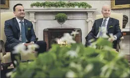  ?? Evan Vucci Associated Press ?? TAOISEACH LEO VARADKAR meets with President Biden in the Oval Office. Varadkar thanked the U.S. on Friday for supporting Ukraine as well as Ireland.