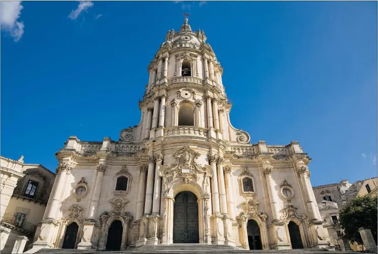  ?? — THE AZALEA GROUP ?? The Cathedral of San Giorgio is a highlight of the city of Modica in spectacula­r Sicily. Modica is part of the glorious Val di Noto.