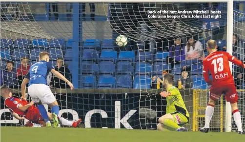  ??  ?? Back of the net: Andrew Mitchell beats Coleraine keeper Chris Johns last night