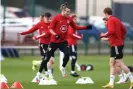  ??  ?? Wales prepare on Tuesday for their World Cup qualifier against Belgium. Photograph: Michael Steele/Getty Images