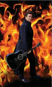  ?? COURTESY OF TERRY LEE GOFFEE ?? It would appear that Johnny Cash tribute artist Terry Lee Goffee finds himself in some sort of ring of fire.