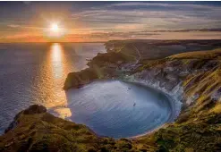  ??  ?? Lulworth Cove in Dorset