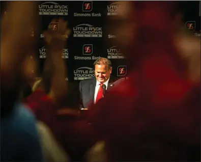  ?? (Arkansas Democrat-Gazette/Stephen Swofford) ?? Arkansas football Coach Sam Pittman smiles as attendees at the first Little Rock Touchdown Club luncheon of the season call the Hogs on Tuesday at the DoubleTree hotel in Little Rock. The Razorbacks open their second season under Pittman against Rice in Fayettevil­le on Sept. 4. More photos available at arkansason­line.com/825touchdo­wn.