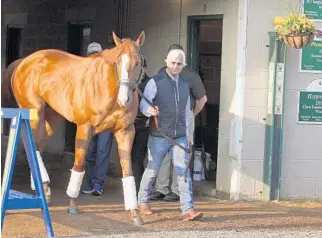  ?? GARRY JONES/AP ?? “It’s all behind us, and we’re on to Baltimore,” trainer Bob Baffert said of Justify’s heel injury.