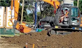  ??  ?? Manawatu’s Sam Scott competing in the excavator operator competitio­n which involves complex tasks like picking up fragile objects.