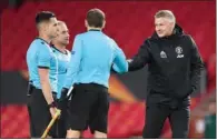  ??  ?? Manchester United’s Norwegian manager Ole Gunnar Solskjaer thanks the officials after the UEFA Europa League semi-final first leg at
Old Trafford on April 29.
