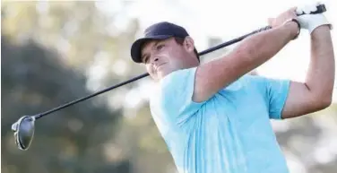  ?? Agence France-presse ?? ↑
Patrick Reed plays his shot from the ninth tee during the second round of the US Open Championsh­ip on Friday.