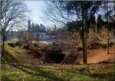  ?? PRUDENCE BRIGHTON — LOWELL SUN ?? The lower Flint Pond dam and spillway in Tyngsboro, as seen in 2020.